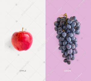 Creative layout made of red apple and grape. Flat lay. Food concept.