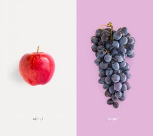 Creative layout made of red apple and grape. Flat lay. Food concept.