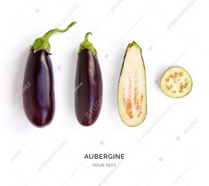 Creative layout made of aubergine. Flat lay. Food concept. Vegetables isolated on white background.