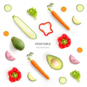 Seamless pattern with red pepper, avocado, onion, cucumber, carrot, lettuce. Vegetables abstract background. Red pepper, avocado, onion, cucumber, carrot, lettuce on the white background.