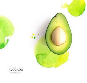 Creative layout made of avocado on the watercolor background. Flat lay. Food concept.
