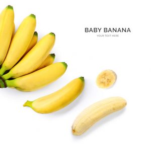 Creative layout made of banana on the white background. Flat lay. Food concept.