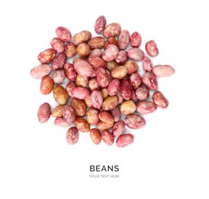 Creative layout made of red beans on white background. Flat lay. Food concept.