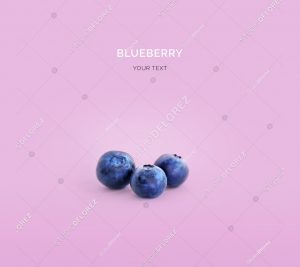 Creative layout made of blueberries. Flat lay. Food concept. Blueberry on purple background.