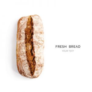 Creative layout made of bread on the white background. Flat lay. Food concept.