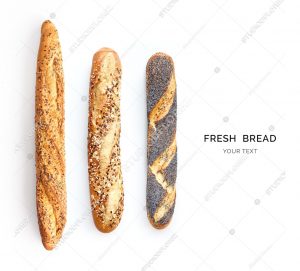 Creative layout made of breads baguette. Flat lay. Food concept.