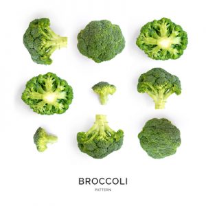 Seamless pattern with broccoli. Vegetables abstract background. Broccoli on the white background.