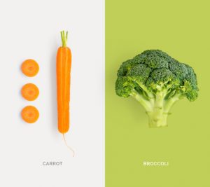 Creative layout made of carrot and broccoli. Flat lay. Food concept.