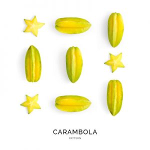 Seamless pattern with carambola. Fruits abstract background. Carambola on the white background.