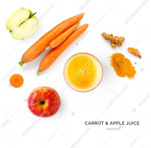 Creative layout made of carrot and apple juice. Flat lay. Food concept. Carrot and apple on the white background.