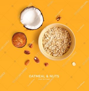 Creative layout made of oatmeal and nuts on yellow background. Flat lay. Food concept.