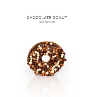 Creative layout made of chocolate donut on the white background. Flat lay. Food concept. Macro  concept.