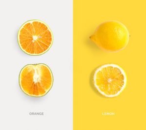 Creative layout made of lemon and orange. Flat lay. Food concept.