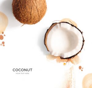 Creative layout made of coconut on the watercolor background. Flat lay. Food concept.