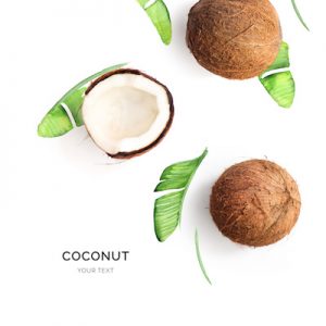 Creative layout made of coconut on the watercolor background. Flat lay. Food concept.