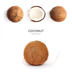 Creative layout made of coconut on the white background. Flat lay. Food concept. Macro  concept.