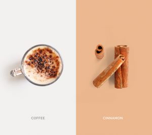 Creative layout made of coffee and cinnamon. Flat lay. Food concept. Macro concept.
