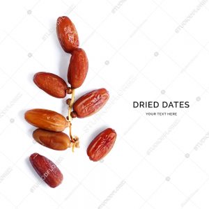 Creative layout made of dried dates on the white background. Flat lay. Food concept.