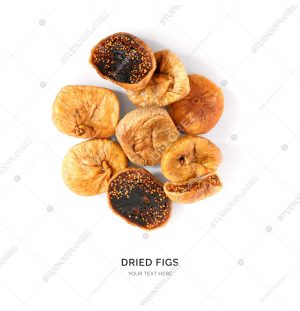 Creative layout made of dried figs on white background.Flat lay. Food concept.