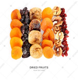 Creative layout made of walnut, dried apricot, dried figs, dried cranberry, raisin on white background.Flat lay. Food concept.
