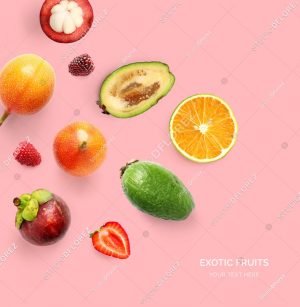 Creative layout made of orange, strawberry, sweet granadilla, mangosteen, blackberry and feijoa. Flat lay. Food concept. Tropical fruits on the yellow background.