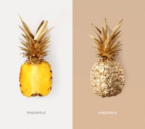 Creative layout made of gold pineapple.  Tropical flat lay. Food concept.