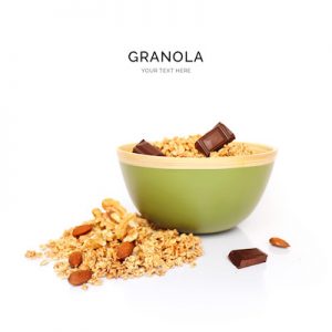 Creative layout made of granola with chocolate and almond isolated on white background.Flat lay. Food concept.