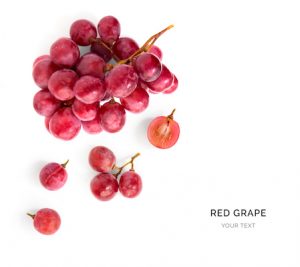 Creative layout made of red grape. Flat lay. Food concept.