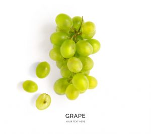 Creative layout made of green grape.  Flat lay. Food concept.