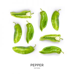 Seamless pattern with green pepper. Vegetables abstract background. Pepper on the white background.