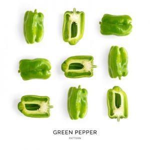 Seamless pattern with green pepper. Vegetables abstract background. Pepper on the white background.