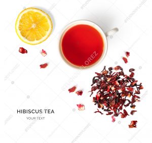 Creative layout made of cup of hibiscus tea and lemon on a white background. Top view.