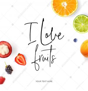 Creative layout made of  quote "I love fruits".  Tropical flat lay. Food concept. Orange, lime, strawberry, blueberry, blackberry and mangosteen on the white background.