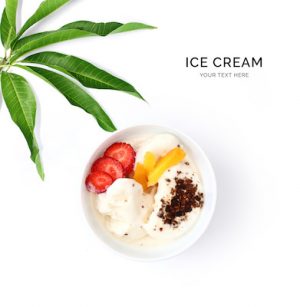 Creative layout made of  ice cream and strawberry. Flat lay. Food concept. Ice cream and fruits on white background.