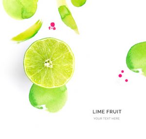 Creative layout made of lime on the watercolor background. Flat lay. Food concept.