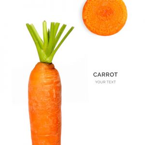 Creative layout made of carrot on the white background. Flat lay. Food concept. Macro  concept.