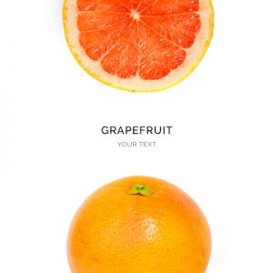Creative layout made of grapefruit on the white background. Flat lay. Food concept. Macro  concept.