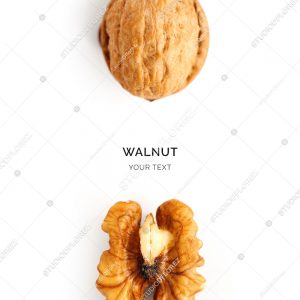 Creative layout made of walnut on the white background. Flat lay. Food concept.