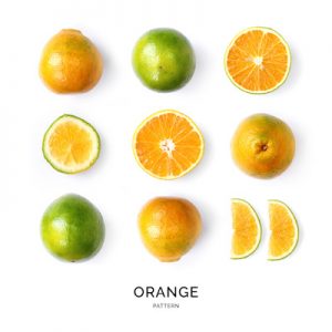 Seamless pattern with orange. Tropical abstract background. Orange fruit on the white background.