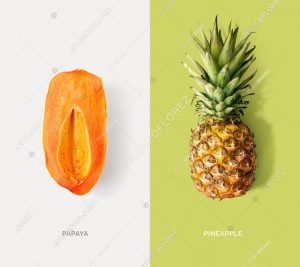 Creative layout made of papaya and pineapple. Flat lay. Food concept.