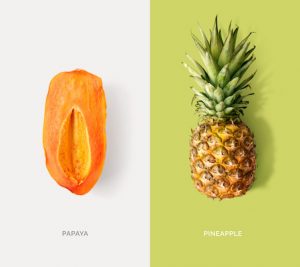 Creative layout made of papaya and pineapple. Flat lay. Food concept.