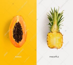 Creative layout made of papaya and pineapple. Flat lay. Food concept.