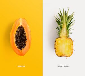 Creative layout made of papaya and pineapple. Flat lay. Food concept.