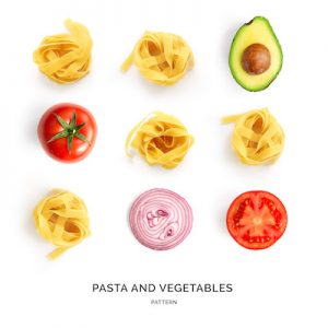 Seamless pattern with pasta, tomato, avocado and onion. Food abstract background. Pasta and vegetables on the white background.