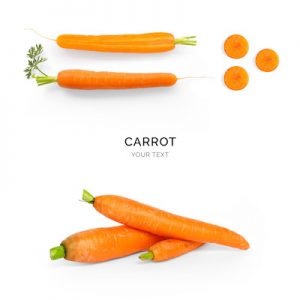 Creative layout made of carrot on the white background. Flat lay. Food concept.