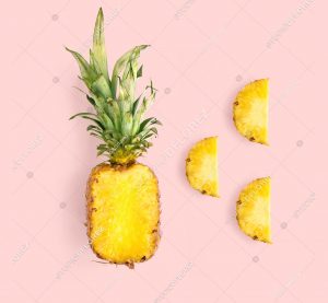 Creative layout made of pineapple on pink background.  Tropical flat lay. Food concept.