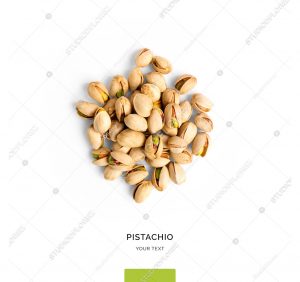Creative layout made of pistachio on white background.Flat lay. Food concept.