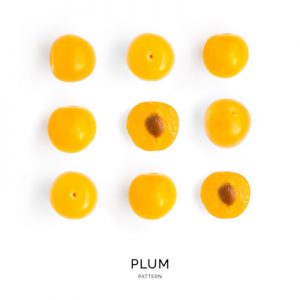 Seamless pattern with plum. Tropical abstract background. Plum on the white background.