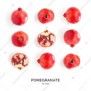 Seamless pattern with pomegranate. Tropical abstract background. Pomegranate on the white background.