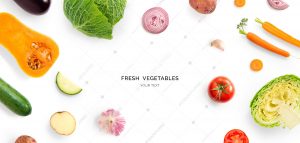 Creative layout made of pumpkin, carrot, tomato, onion and cabbage, zucchini, aubergine and garlic. Flat lay. Food concept.